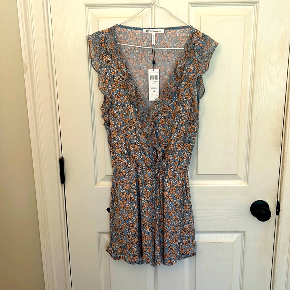 Women’s BCBG floral romper. Blue with peach flowers. Never worn, with tags!